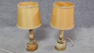 A pair of mid 20th century vintage onyx and gilt metal table lamps. H.40cm