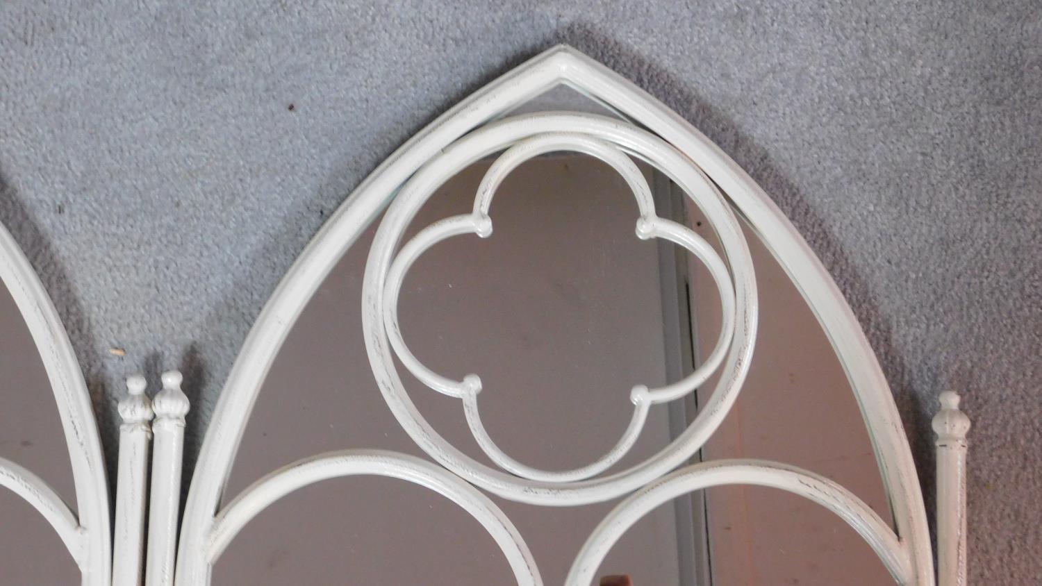 A set of three wrought metal painted gothic style mirrors. 103x54cm - Image 2 of 3