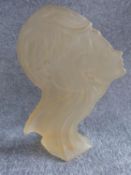 A frosted acrylic Art Deco statue of a male and female figure side profile. Label to base reads