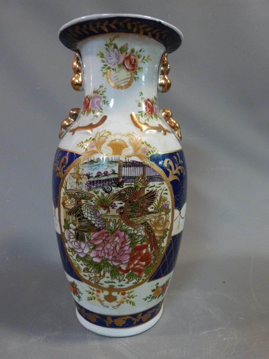 A ceramic elephant plant stand and a large Chinese oriental vase with birds and flowers and gilded - Image 7 of 10