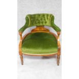 A late Victorian inlaid rosewood tub armchair in buttoned upholstery on turned supports. H.66cm