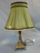An Empire style antique alabaster and bronze lamp with green pleated silk shade. Central alabaster