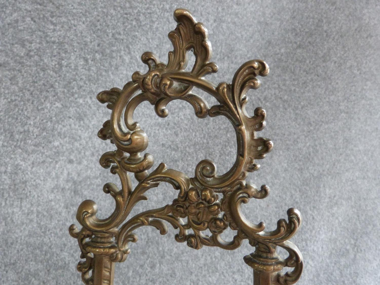 A copper relief moulded wall plaque with male and female figures and a vintage brass openwork easel. - Image 7 of 7