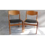 A pair of mid 20th century teak dining chairs. H.75