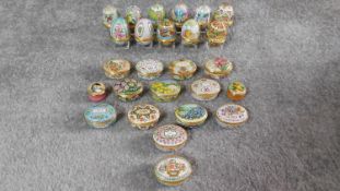 A collection of twenty six Halcyon Days enamel boxes. Annual year boxes from 1990 to 2002, and