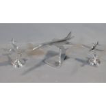 A collection of three vintage style desk top chromium aeroplane models.