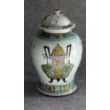 A Chinese temple jar and cover with allover Chinese character marks. H.42cm