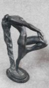 A vintage cast plaster Art Deco style statue of a female. Signed to base. H.57cm