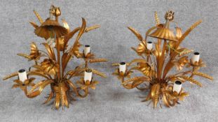 A pair of gilt metal four light ceiling chandeliers with wheatsheaf decoration. H.42cm