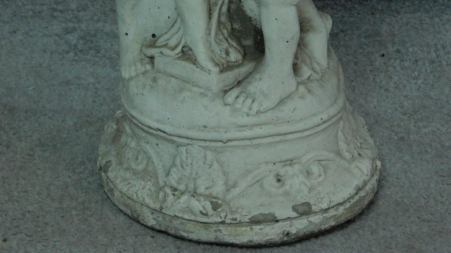 A painted concrete birdbath and seated buddah. Birdbath with three cherubs holding an urn. H.54 ( - Image 7 of 7