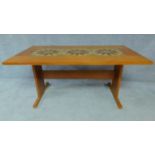 A 1970's vintage teak dining table with ceramic inlaid top. H.72 W.159 D.89cm