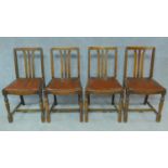 A set of four mid 20th century oak dining chairs. H.84cm