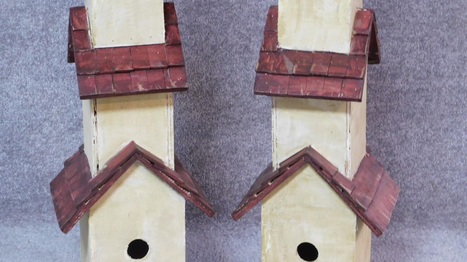 A pair of multi tiered bird houses. H.81cm - Image 3 of 4