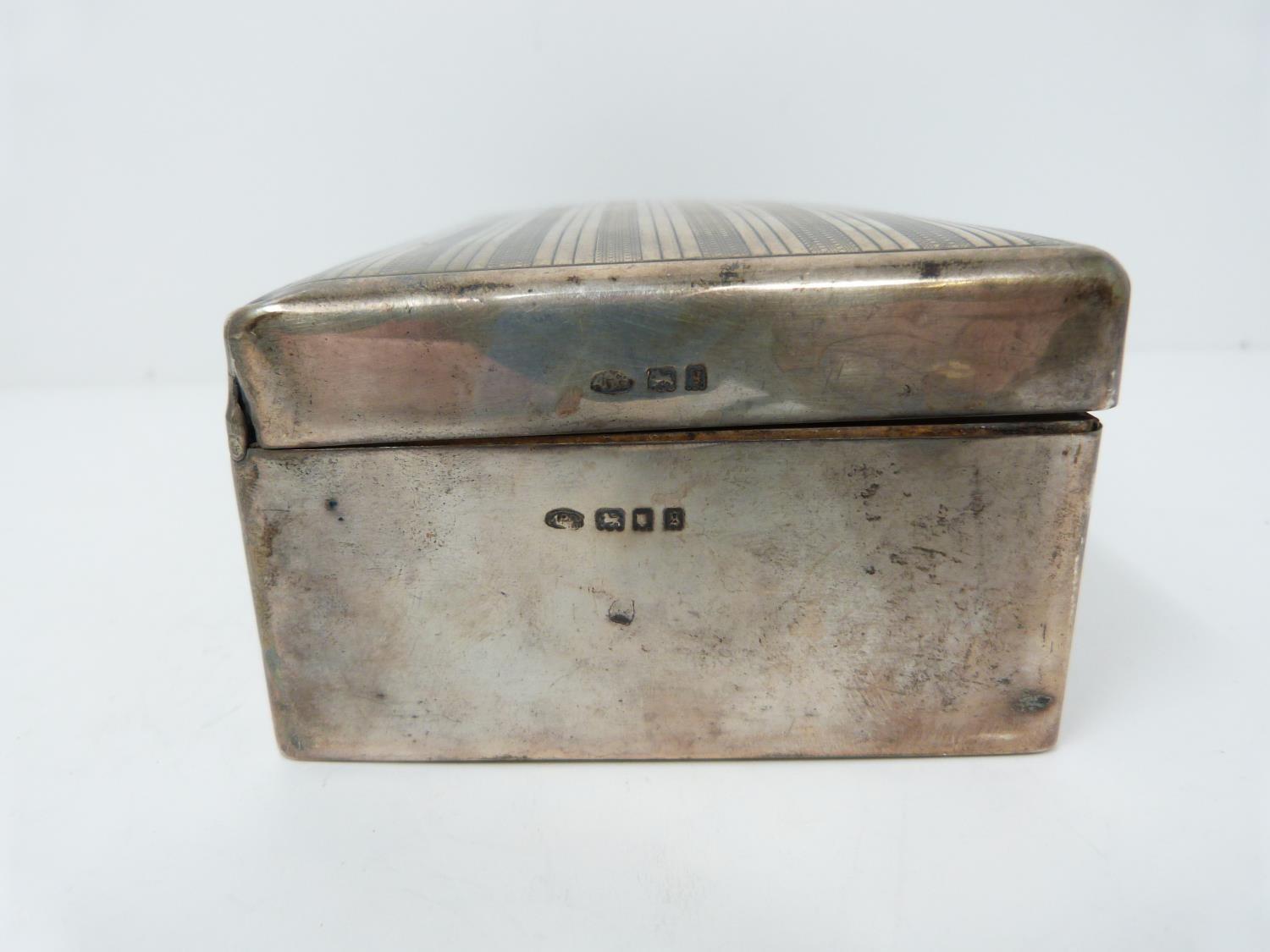 A silver cigarette box, cedar lined, London 1922, Alex Clark Ltd, inscribed with dedication. - Image 3 of 5