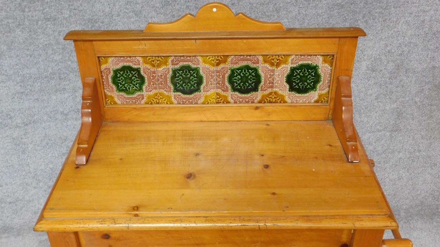 A Victorian pine washstand with original inset coloured tiles to the back fitted with a towel rail - Image 3 of 8