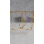 A pair of contemporary gilt metal framed occasional tables with dark smoked glass tops. H.67 W.36