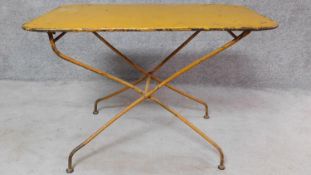 A folding metal garden table stamped to underside. H.71 W.100 D.60cm