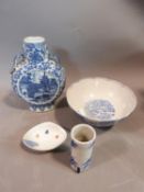 A collection of Japanese and Chinese ceramics including two handled moon vase, Blue and white