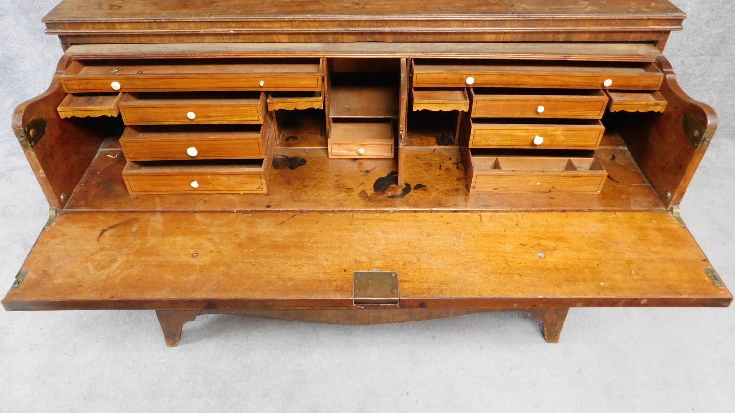 A late Georgian mahogany library bookcase with upper glazed section above fitted central - Image 3 of 9