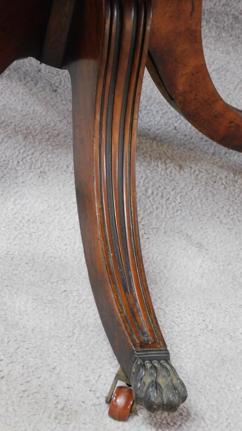 A Regency mahogany drop flap Pembroke table fitted end drawer on swept fluted quadruped supports. - Image 5 of 8