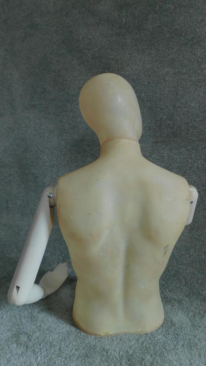 A moulded male mannequin, head and torso with articulated arms. H.80cm - Image 3 of 3