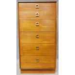 A mid 20th century teak tall chest of drawers with brass drop handles. H.108 W.55 D.46cm