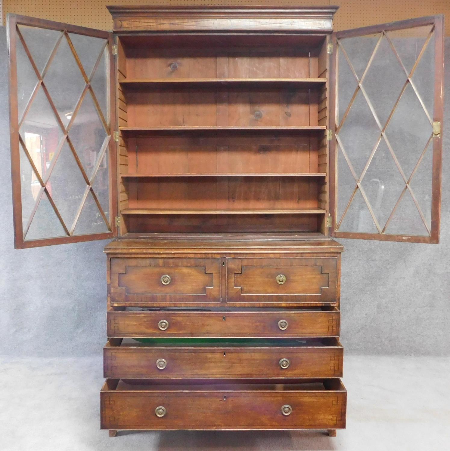 A late Georgian mahogany library bookcase with upper glazed section above fitted central - Image 2 of 9