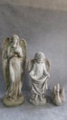 Three miscellaneous moulded garden statues. H.122cm (highest)