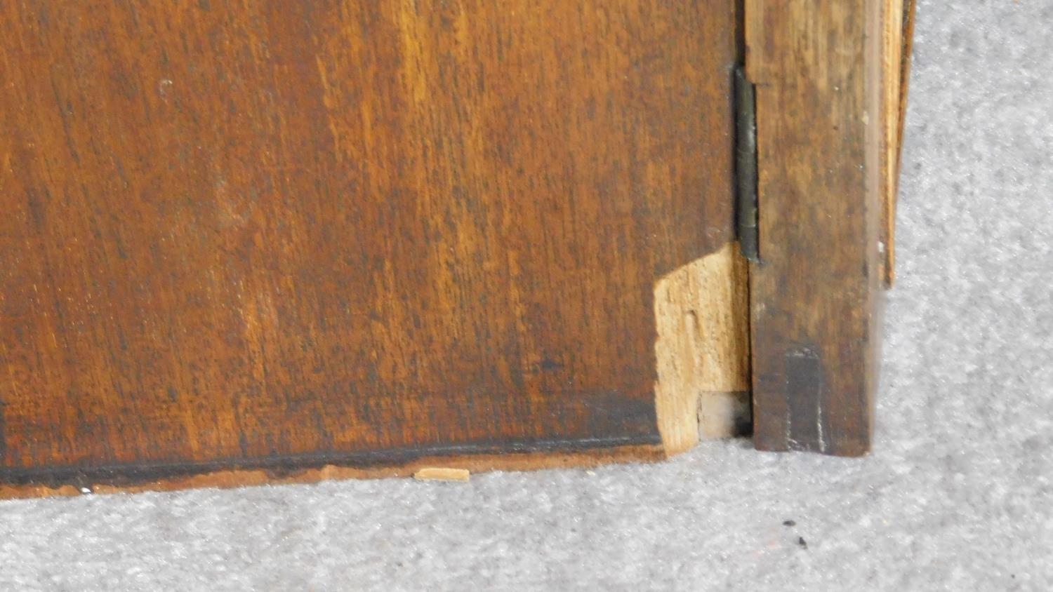 A late Georgian mahogany library bookcase with upper glazed section above fitted central - Image 9 of 9