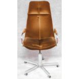 A mid 20th century Pieff executive's office armchair. H.113cm