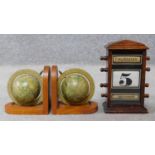 Two globe bookends together with an antique wooden perpetual desk calendar H.22cm (calendar).