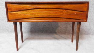 A mid 20th century rosewood two drawer chest by Arne Vodder for NC Mobler, Odense, label to