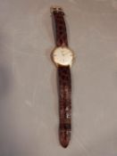 A vintage Longines Mens Watch with brown alligator leather strap and Longines buckle. Not working.