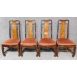 A set of four teak dining chairs with Chinese character motifs to back splat. H.105cm