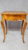 A Victorian burr walnut work table with vanity mirror to fitted interior with allover Arabesque