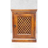 An eastern teak small cabinet with lattice panel door. H.65 W.50 D.42cm