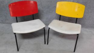 A pair of Danish metal framed chairs with laminated backs and calico seats stamped Horning to