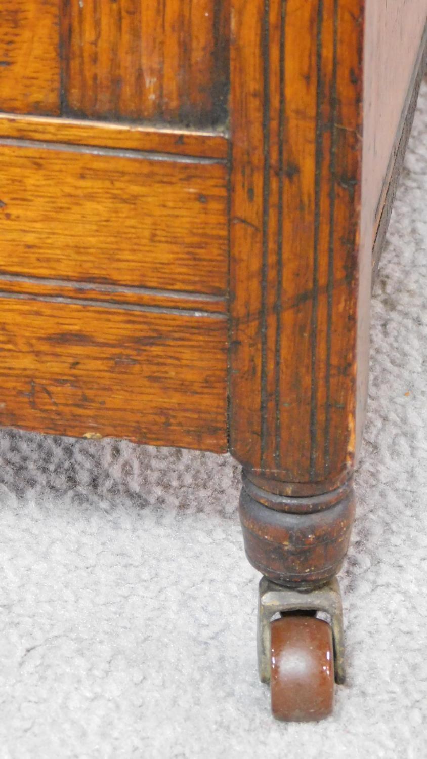 A Victorian oak coal purdonium with carved floral fall front revealing coal compartment. H.97 W.39 - Image 10 of 11