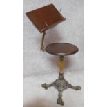 A 19th century mahogany occasional table with fluted brass column on coalbrookdale style quadruped