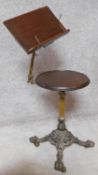 A 19th century mahogany occasional table with fluted brass column on coalbrookdale style quadruped