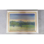 A framed oil on canvas, a view from Parliament Hill, indistinctly signed. 95x69cm