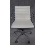 An Eames style desk chair on chrome base. H.92cm