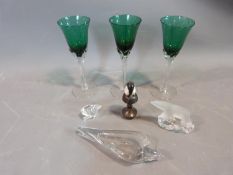 A collection of glass and ceramic items, including three turquoise glass twist stem glasses, a