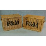 A pair of Fortnum & Mason wicker hampers. H.37 W.57 D.38cm