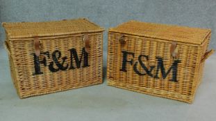 A pair of Fortnum & Mason wicker hampers. H.37 W.57 D.38cm