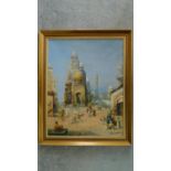 A framed oil on board depicting a town scene in Cairo. Signed by artist. 74x60cm