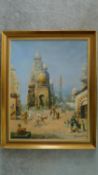 A framed oil on board depicting a town scene in Cairo. Signed by artist. 74x60cm