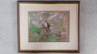 A framed and glazed oil on paper, in the manner of Fred Cuming (b.1930), bird on a branch, signed to