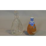A Chinese ceramic vase and cut glass decanter. Vase with blue and white decoration of birds among