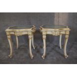 a pair of cream and gilt carved coffee tables with shaped bevelled inset glass tops. 60cm x 60cm.